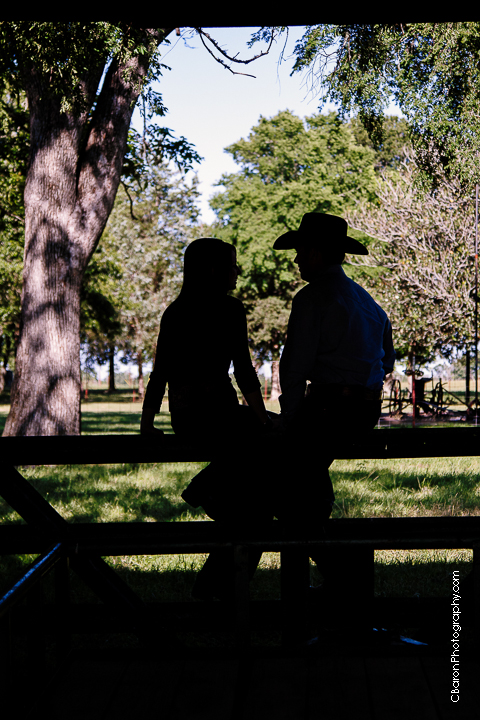 C. Baron Photography, rustic,Houston Wedding Photographer, Magnolia Wedding Photographer, old barn, cowboy boots, cowboy hat, cowboy culture, belt buckle, rodeo, engagement