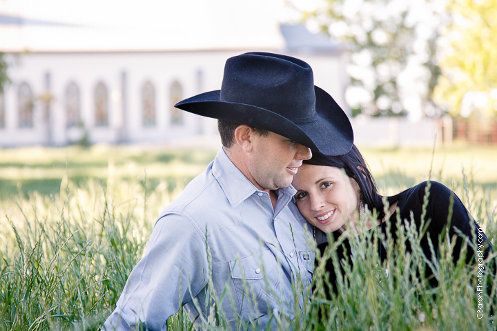 C. Baron Photography, Houston Wedding Photographer, Magnolia Wedding Photographer, old barn, cowboy boots, cowboy hat, cowboy culture, belt buckle, rodeo, engagement, rustic