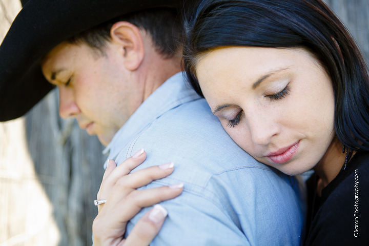 C. Baron Photography, Houston Wedding Photographer, Magnolia Wedding Photographer, old barn, cowboy boots, cowboy hat, cowboy culture, belt buckle, rodeo, engagement, rustic