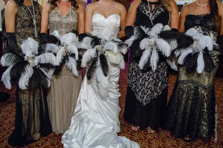 C. Baron Photography, Houston Wedding Photography, Majestic Metro, downtown Houston, gold, Gatsby, bride, groom, 20's, Hotel Icon, old movie theater, royals royce, feathers, beads