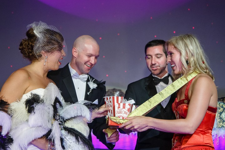 C. Baron Photography, Houston Wedding Photography, Majestic Metro, downtown Houston, gold, Gatsby, bride, groom, 20's, Hotel Icon, old movie theater, royals royce, feathers, beads