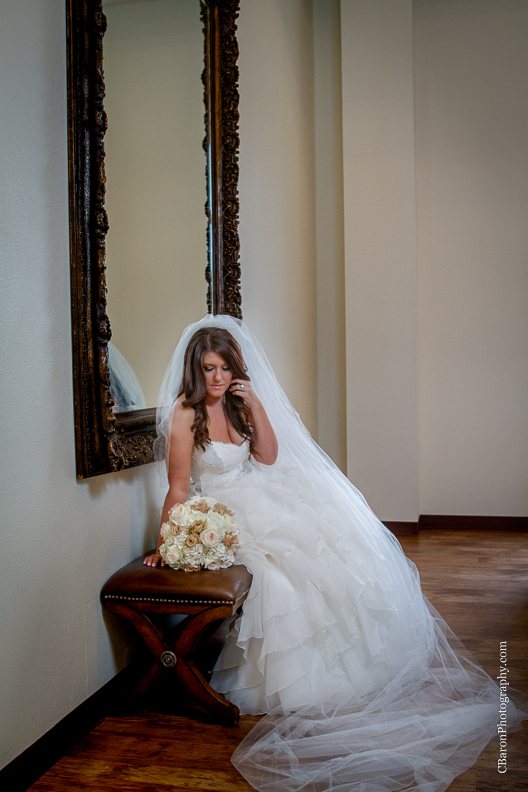 C. Baron Photography, Houston Wedding Photographer, Briscoe Manor, Richmond Texas, longhorn cattle, chapel, Paloma Blanca, cathedral veil, ruffled ballgown, cowboy boots