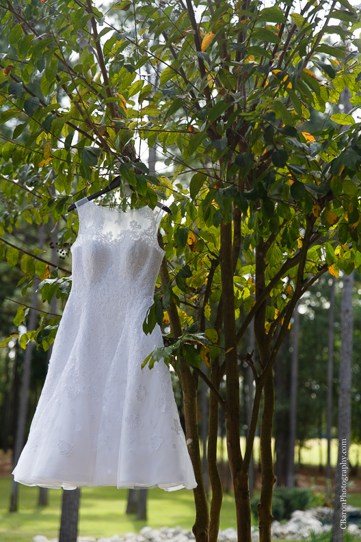 C. Baron Photography, Houston Wedding Photographer, Crystal Springs, Magnolia Texas, Magnolia Wedding Photographer, outdoor wedding, purple, red, Oleg Cassini, illusion neckline, tea length, tatoo, brooch bouquet, birdcage veil, rockabilly, edgy, sunset