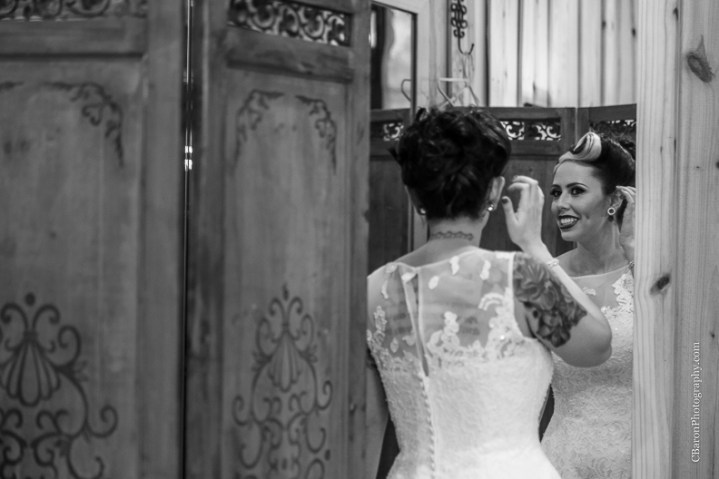 C. Baron Photography, Houston Wedding Photographer, Crystal Springs, Magnolia Texas, Magnolia Wedding Photographer, outdoor wedding, purple, red, Oleg Cassini, illusion neckline, tea length, tatoo, brooch bouquet, birdcage veil, rockabilly, edgy, sunset