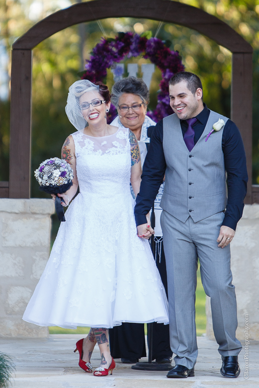 C. Baron Photography, Houston Wedding Photographer, Crystal Springs, Magnolia Texas, Magnolia Wedding Photographer, outdoor wedding, purple, red, Oleg Cassini, illusion neckline, tea length, tatoo, brooch bouquet, birdcage veil, rockabilly, edgy, sunset