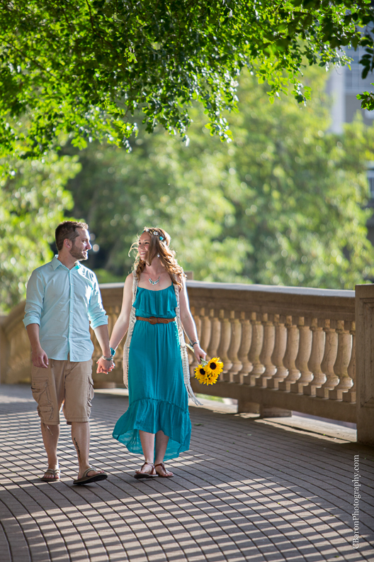 C. Baron Photography, Houston Engagement Photographer, Sesquicentennial Park, downtown, bohemian, floral headpiece, guitar, spring, waterfall, Buffalo Bayou