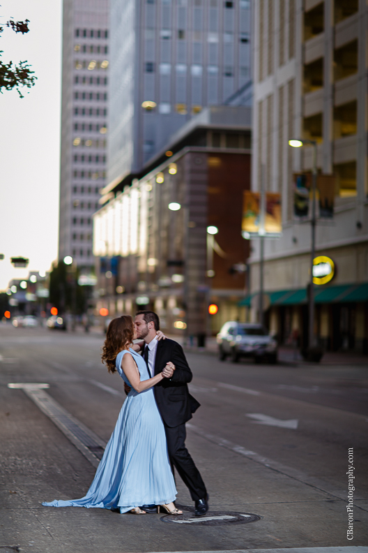 C. Baron Photography, Houston Engagement Photographer, downtown, dramatic, fountains, buildings, Blue Oscar Gown, fall, Formal Wear