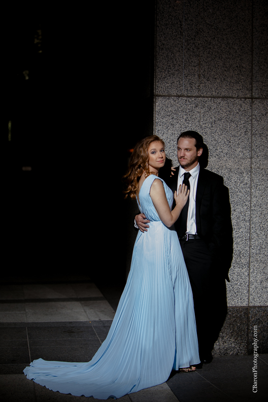 C. Baron Photography, Houston Engagement Photographer, downtown, dramatic, fountains, buildings, Blue Oscar Gown, fall, Formal Wear