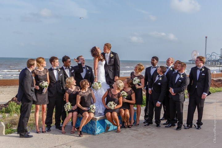 C. Baron Photography, Galveston Wedding Photographer, Hotel Galvez and Spa, beach, black, white, bride, groom, couple, Centennial Lawn, Music Hall, Downtown Blooms, Pleasure Pier, seawall, birds, sparklers, fit and flair gown, ruffles, June