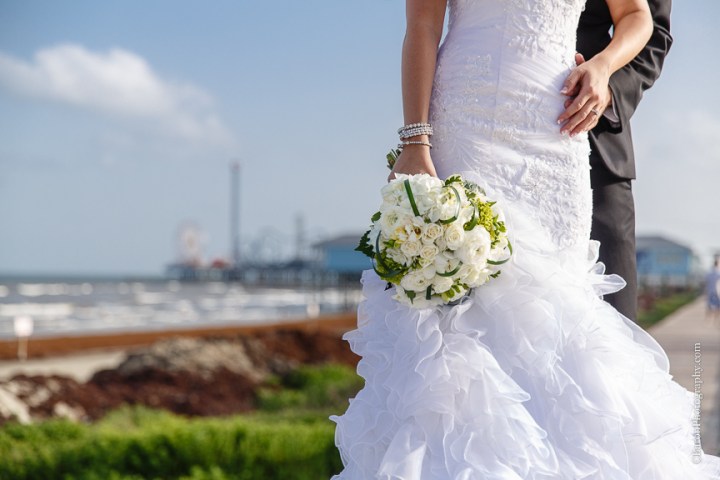C. Baron Photography, Galveston Wedding Photographer, Hotel Galvez and Spa, beach, black, white, bride, groom, couple, Centennial Lawn, Music Hall, Downtown Blooms, Pleasure Pier, seawall, birds, sparklers, fit and flair gown, ruffles, June