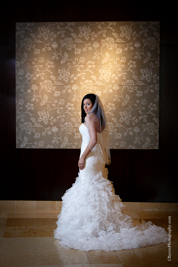 C. Baron Photography, Houston Wedding Photographer, Hilton Americas Houston, fit and flair gown, formals, ruffles, Spring, June, bridals, downtown, park, Discovery Green, marble, veil