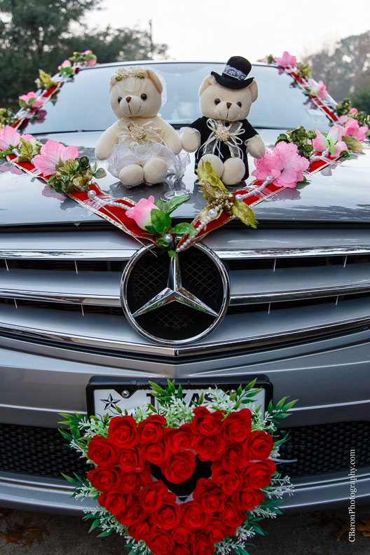 C. Baron Photography, Houston Wedding Photographer, blush, red, bride, groom, confetti cannons, confettti poppers, glow sticks, gold, firecrackers, roasted pig, bubbles, tea ceremony, incense sticks