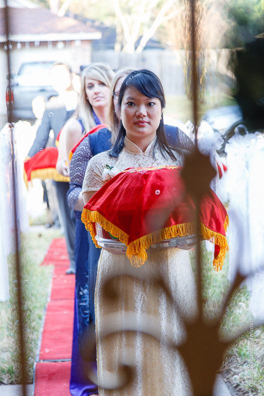 C. Baron Photography, Houston Wedding Photographer, blush, red, bride, groom, confetti cannons, confettti poppers, glow sticks, gold, firecrackers, roasted pig, bubbles, tea ceremony, incense sticks