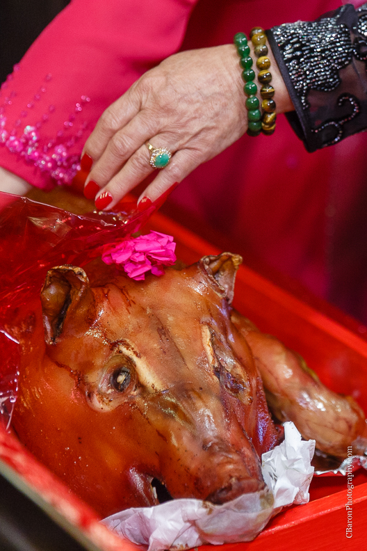 C. Baron Photography, Houston Wedding Photographer, blush, red, bride, groom, confetti cannons, confettti poppers, glow sticks, gold, firecrackers, roasted pig, bubbles, tea ceremony, incense sticks