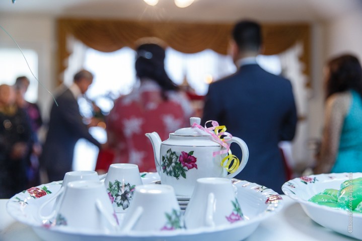 C. Baron Photography, Houston Wedding Photographer, blush, red, bride, groom, confetti cannons, confettti poppers, glow sticks, gold, firecrackers, roasted pig, bubbles, tea ceremony, incense sticks