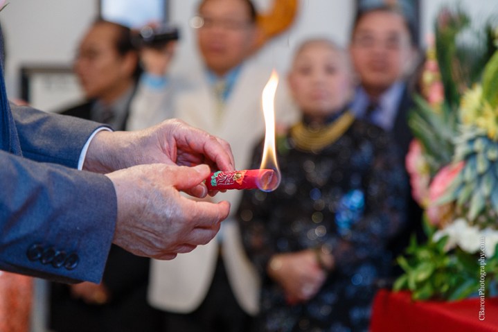 C. Baron Photography, Houston Wedding Photographer, blush, red, bride, groom, confetti cannons, confettti poppers, glow sticks, gold, firecrackers, roasted pig, bubbles, tea ceremony, incense sticks