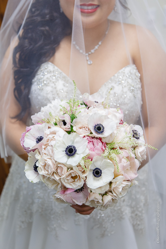 C. Baron Photography, Houston Wedding Photographer, Notre Dame Catholic Church, blush, bride, groom, couple, confetti cannons, confetti poppers, gold, stained glass, cathedral veil, Vietnamese, chandelier, sparklers, South Asian