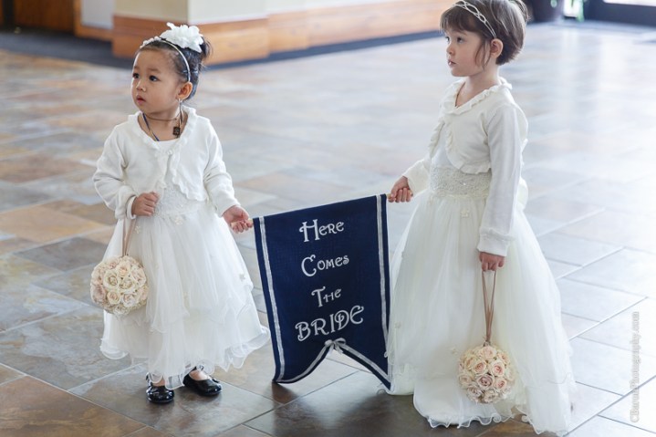 C. Baron Photography, Houston Wedding Photographer, Notre Dame Catholic Church, blush, bride, groom, couple, confetti cannons, confetti poppers, gold, stained glass, cathedral veil, Vietnamese, chandelier, sparklers, South Asian