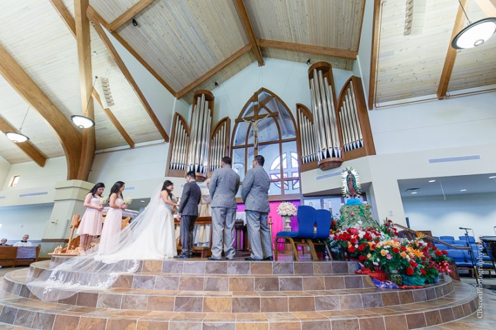 C. Baron Photography, Houston Wedding Photographer, Notre Dame Catholic Church, blush, bride, groom, couple, confetti cannons, confetti poppers, gold, stained glass, cathedral veil, Vietnamese, chandelier, sparklers, South Asian