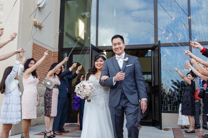 C. Baron Photography, Houston Wedding Photographer, Notre Dame Catholic Church, blush, bride, groom, couple, confetti cannons, confetti poppers, gold, stained glass, cathedral veil, Vietnamese, chandelier, sparklers, South Asian