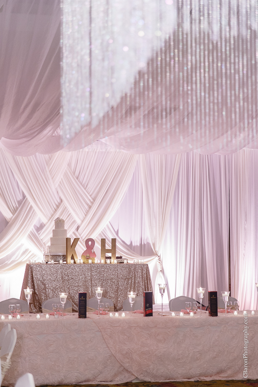 C. Baron Photography, Houston Wedding Photographer, Notre Dame Catholic Church, blush, bride, groom, couple, confetti cannons, confetti poppers, gold, stained glass, cathedral veil, Vietnamese, chandelier, sparklers, South Asian