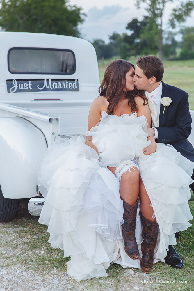 C. Baron Photography, Houston Wedding Photographer, Olde Dobbin Station, St. Mary's Catholic Church, 53 Chevy pickup truck, sparklers, 2014, country chic, first look, hot, pink, white, cowboy boots, sunglasses, strapless, ruffles, lace, cathedral veil, s'mores, stained glass, painted church, Texas, Paloma Blanca