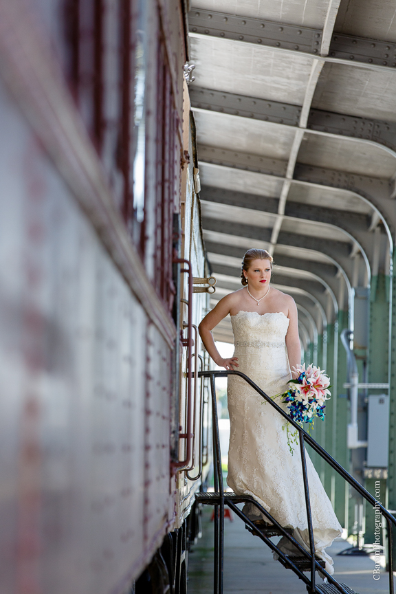 C. Baron Photography, bridals, formals, Galveston Railroad Museum, Galveston Wedding Photographer, Houston Wedding Photographer, trains, bouquet, Island Flowers, strapless, lace, lilies, orchids, Whittington Bridals, railroad car, veil