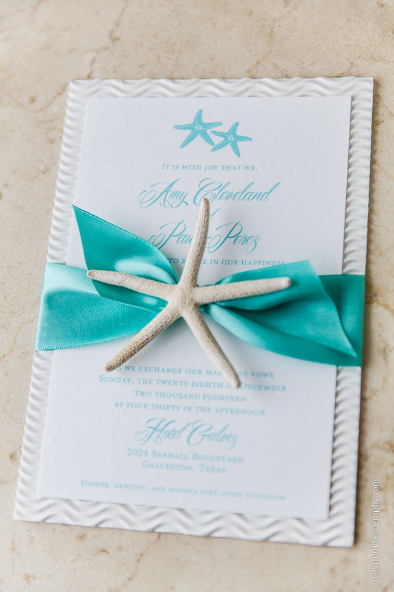 C. Baron Photography, Galveston Wedding Photographer, Hotel Galvez and Spa, blue, Christmas, December, Downtown Blooms, groom, bride, couple, seawall, waves, starfish, veil, umbrella, Pleasure Pier, rain, candy bar, beach