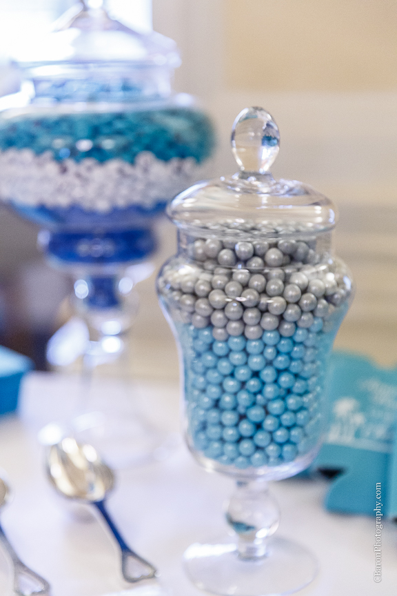 C. Baron Photography, Galveston Wedding Photographer, Hotel Galvez and Spa, blue, Christmas, December, Downtown Blooms, groom, bride, couple, seawall, waves, starfish, veil, umbrella, Pleasure Pier, rain, candy bar, beach