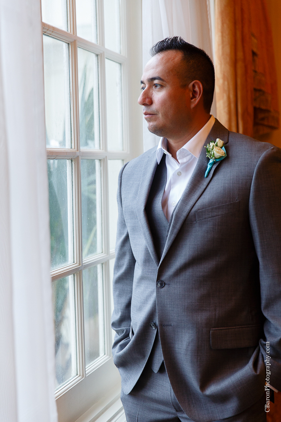 C. Baron Photography, Galveston Wedding Photographer, Hotel Galvez and Spa, blue, Christmas, December, Downtown Blooms, groom, bride, couple, seawall, waves, starfish, veil, umbrella, Pleasure Pier, rain, candy bar, beach