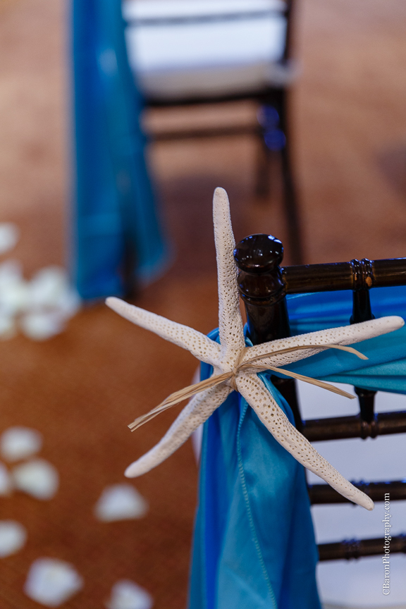 C. Baron Photography, Galveston Wedding Photographer, Hotel Galvez and Spa, blue, Christmas, December, Downtown Blooms, groom, bride, couple, seawall, waves, starfish, veil, umbrella, Pleasure Pier, rain, candy bar, beach