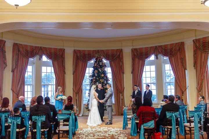 C. Baron Photography, Galveston Wedding Photographer, Hotel Galvez and Spa, blue, Christmas, December, Downtown Blooms, groom, bride, couple, seawall, waves, starfish, veil, umbrella, Pleasure Pier, rain, candy bar, beach
