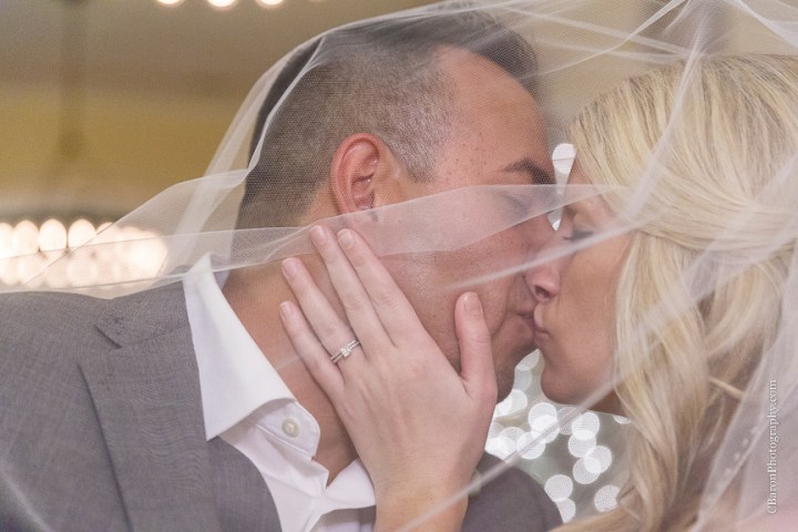 C. Baron Photography, Galveston Wedding Photographer, Hotel Galvez and Spa, blue, Christmas, December, Downtown Blooms, groom, bride, couple, seawall, waves, starfish, veil, umbrella, Pleasure Pier, rain, candy bar, beach