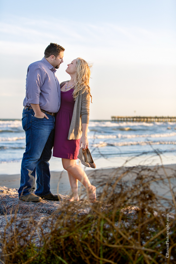 C. Baron Photography, Galveston Engagement Photographer, Houston Engagement Photographer, beach, couple, Galveston, Texas, jetties, surf, waves, sunset