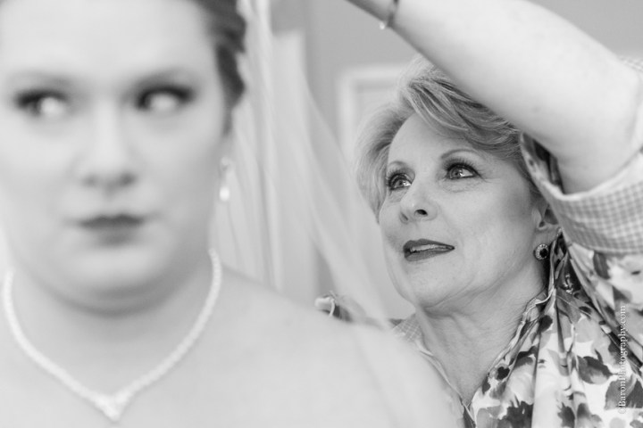 C. Baron Photography; Casablanca lilies; Cinderella cake; Couple; Galveston Wedding Photographer; Hotel Galvez; Houston Wedding Photographer; Music Hall; Spring; Strapless; Texas; blue; blue galaxy orchid; bride; confetti; dendrobium; first look; galveston; groom; lace; purple; rain; reception; sand; seawall; ceremony; singapore orchid; teal; 