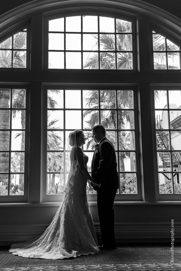 C. Baron Photography; Casablanca lilies; Cinderella cake; Couple; Galveston Wedding Photographer; Hotel Galvez; Houston Wedding Photographer; Music Hall; Spring; Strapless; Texas; blue; blue galaxy orchid; bride; confetti; dendrobium; first look; galveston; groom; lace; purple; rain; reception; sand; seawall; ceremony; singapore orchid; teal; 