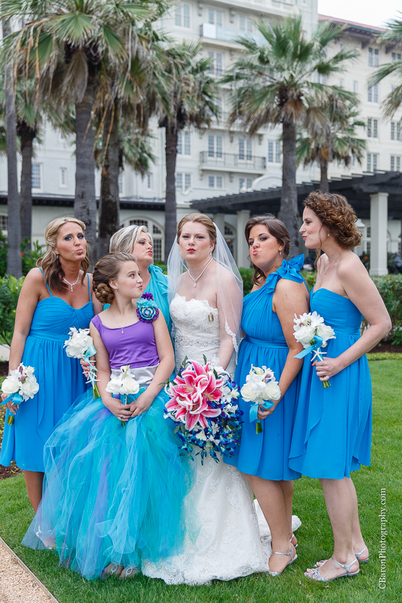 C. Baron Photography; Casablanca lilies; Cinderella cake; Couple; Galveston Wedding Photographer; Hotel Galvez; Houston Wedding Photographer; Music Hall; Spring; Strapless; Texas; blue; blue galaxy orchid; bride; confetti; dendrobium; first look; galveston; groom; lace; purple; rain; reception; sand; seawall; ceremony; singapore orchid; teal; 