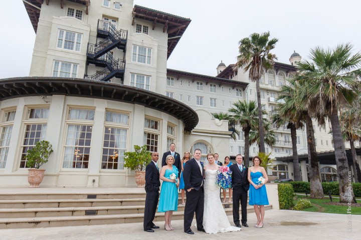 C. Baron Photography; Casablanca lilies; Cinderella cake; Couple; Galveston Wedding Photographer; Hotel Galvez; Houston Wedding Photographer; Music Hall; Spring; Strapless; Texas; blue; blue galaxy orchid; bride; confetti; dendrobium; first look; galveston; groom; lace; purple; rain; reception; sand; seawall; ceremony; singapore orchid; teal; 