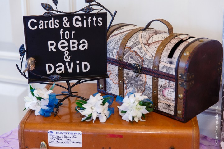 C. Baron Photography; Casablanca lilies; Cinderella cake; Couple; Galveston Wedding Photographer; Hotel Galvez; Houston Wedding Photographer; Music Hall; Spring; Strapless; Texas; blue; blue galaxy orchid; bride; confetti; dendrobium; first look; galveston; groom; lace; purple; rain; reception; sand; seawall; ceremony; singapore orchid; teal; 