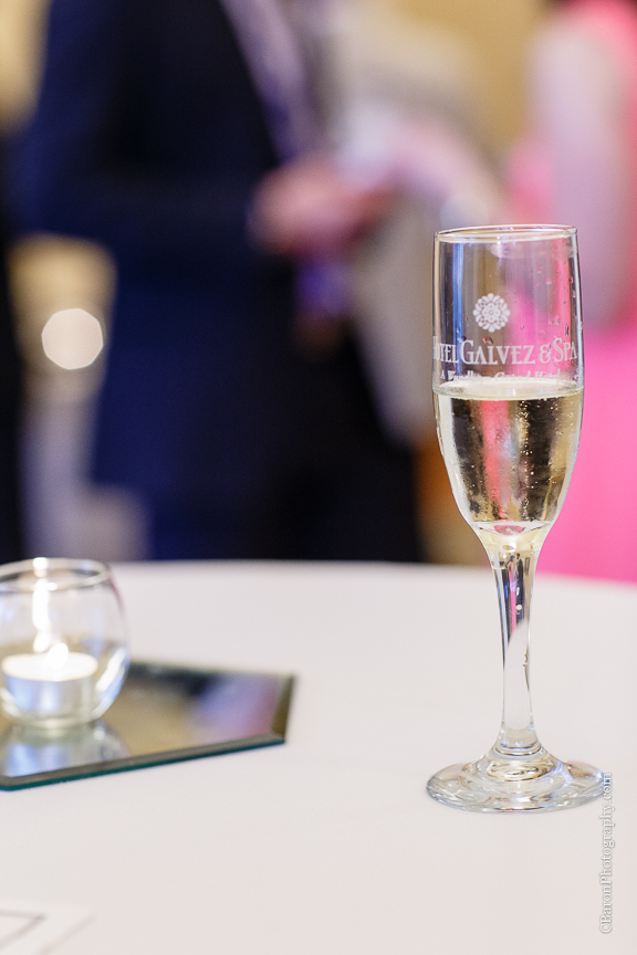 C. Baron Photography; Casablanca lilies; Cinderella cake; Couple; Galveston Wedding Photographer; Hotel Galvez; Houston Wedding Photographer; Music Hall; Spring; Strapless; Texas; blue; blue galaxy orchid; bride; confetti; dendrobium; first look; galveston; groom; lace; purple; rain; reception; sand; seawall; ceremony; singapore orchid; teal; 