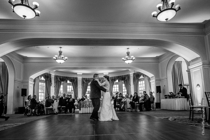 C. Baron Photography; Casablanca lilies; Cinderella cake; Couple; Galveston Wedding Photographer; Hotel Galvez; Houston Wedding Photographer; Music Hall; Spring; Strapless; Texas; blue; blue galaxy orchid; bride; confetti; dendrobium; first look; galveston; groom; lace; purple; rain; reception; sand; seawall; ceremony; singapore orchid; teal; 