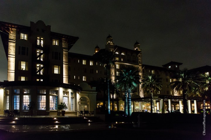 C. Baron Photography; Casablanca lilies; Cinderella cake; Couple; Galveston Wedding Photographer; Hotel Galvez; Houston Wedding Photographer; Music Hall; Spring; Strapless; Texas; blue; blue galaxy orchid; bride; confetti; dendrobium; first look; galveston; groom; lace; purple; rain; reception; sand; seawall; ceremony; singapore orchid; teal; 