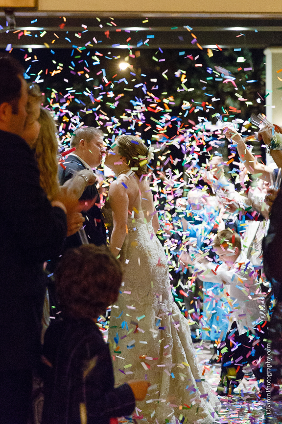 C. Baron Photography; Casablanca lilies; Cinderella cake; Couple; Galveston Wedding Photographer; Hotel Galvez; Houston Wedding Photographer; Music Hall; Spring; Strapless; Texas; blue; blue galaxy orchid; bride; confetti; dendrobium; first look; galveston; groom; lace; purple; rain; reception; sand; seawall; ceremony; singapore orchid; teal; 