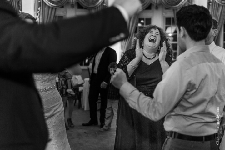 C. Baron Photography; Casablanca lilies; Cinderella cake; Couple; Galveston Wedding Photographer; Hotel Galvez; Houston Wedding Photographer; Music Hall; Spring; Strapless; Texas; blue; blue galaxy orchid; bride; confetti; dendrobium; first look; galveston; groom; lace; purple; rain; reception; sand; seawall; ceremony; singapore orchid; teal; 