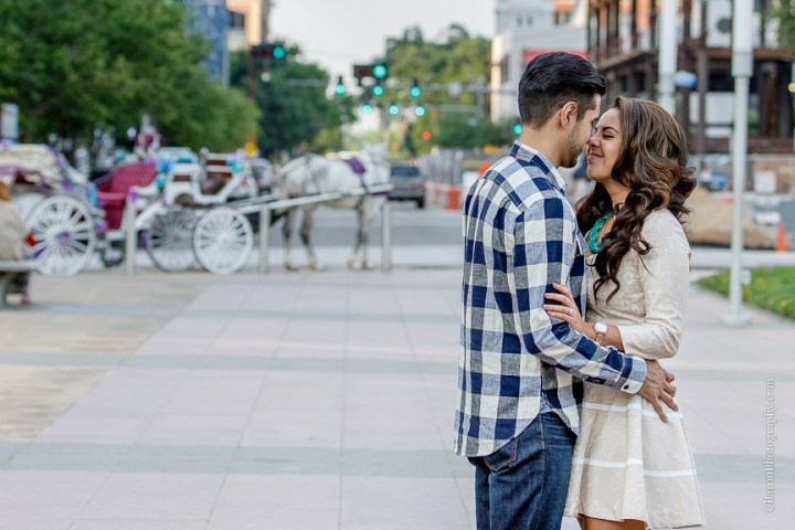 Buildings; C. Baron Photography; Couple; Discovery Green; Downtown; Dress; Engagement; Houston Engagement Photographer; Houston Wedding PHotographer; Nature; Park; Spring; Springtime; Texas; 