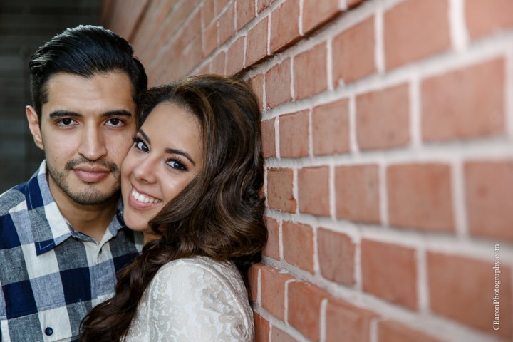 Buildings; C. Baron Photography; Couple; Discovery Green; Downtown; Dress; Engagement; Houston Engagement Photographer; Houston Wedding PHotographer; Nature; Park; Spring; Springtime; Texas; 