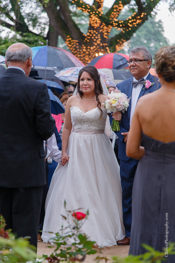 Aggie; Aggie Ring Cake; Astilbe; Ball gown; C. Baron Photography; Gold; Houston Wedding Photographer; Ivory; Live Oak; Oak Tree Manor; Pink; Rainy; Spring; Strapless; Texas; Umbrellas; Vintage; Wedding; Woodlands Wedding Photographer; ceremony; cord ceremony; outdoor; reception; roses; 