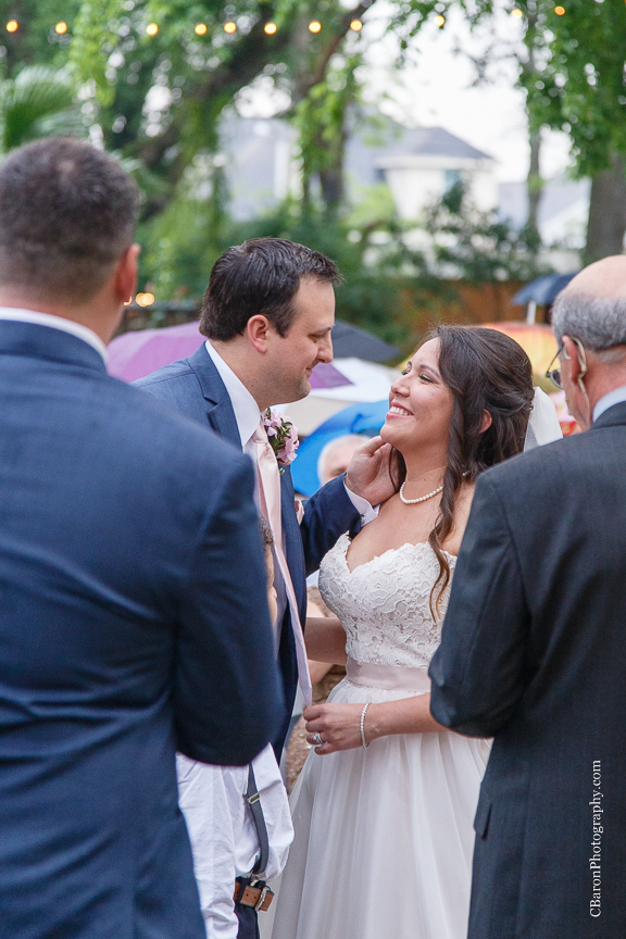 Aggie; Aggie Ring Cake; Astilbe; Ball gown; C. Baron Photography; Gold; Houston Wedding Photographer; Ivory; Live Oak; Oak Tree Manor; Pink; Rainy; Spring; Strapless; Texas; Umbrellas; Vintage; Wedding; Woodlands Wedding Photographer; ceremony; cord ceremony; outdoor; reception; roses; 