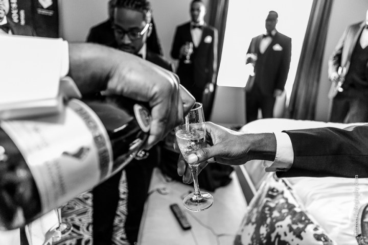 Baby's breath; Black Tie; Blush gown; Brooch Bouquet; Brooch Boutin boutonnière; C. Baron Photography; Clutch purse; Downtown Houston; Evening; First look. Spring; Houston Wedding PHotographer; Swanky Photobooth; Texas; The Sam Houston Hotel; Veranda; blush; strapless;