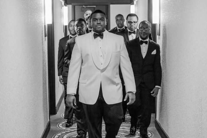 Baby's breath; Black Tie; Blush gown; Brooch Bouquet; Brooch Boutin boutonnière; C. Baron Photography; Clutch purse; Downtown Houston; Evening; First look. Spring; Houston Wedding PHotographer; Swanky Photobooth; Texas; The Sam Houston Hotel; Veranda; blush; strapless;